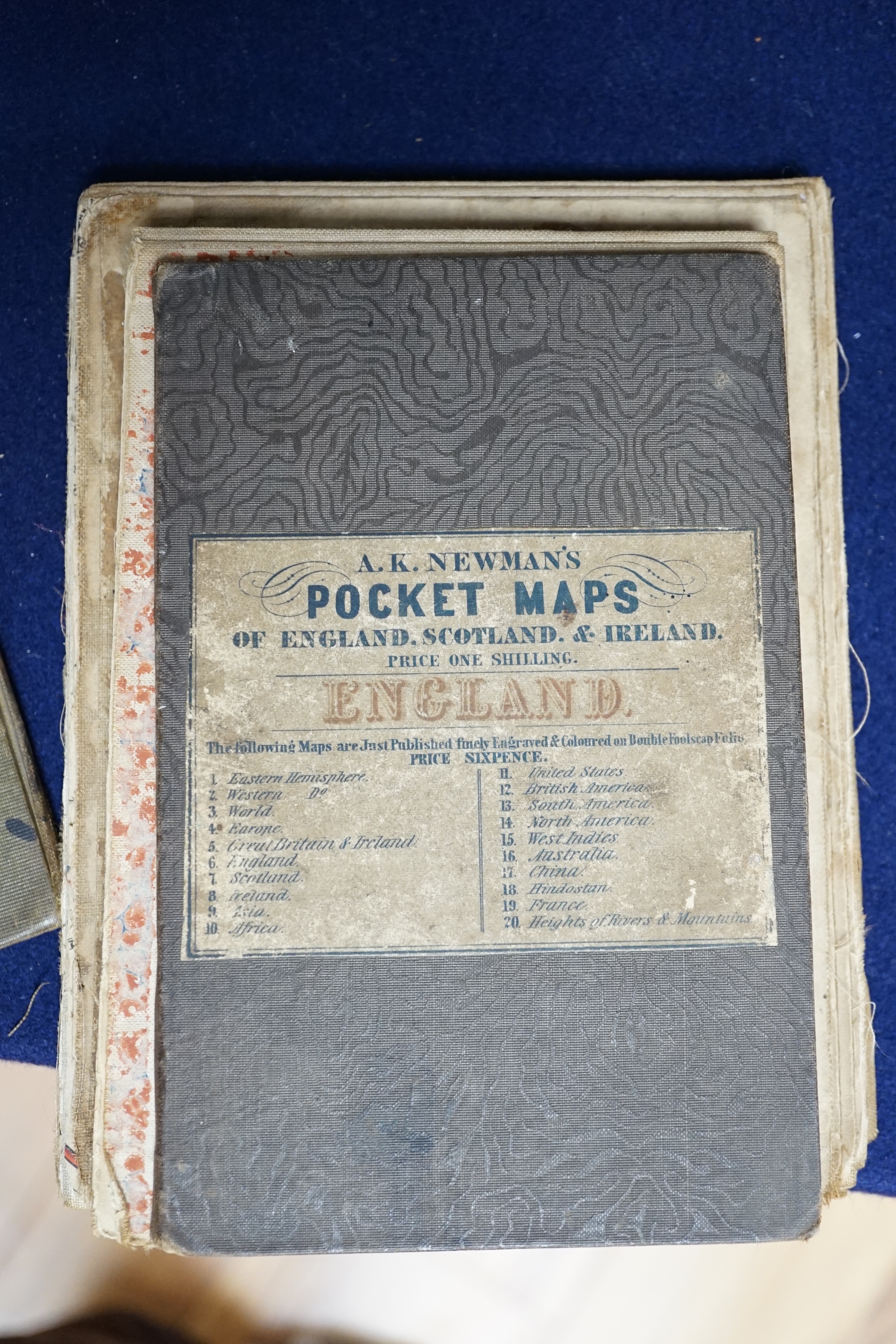 Five mid-19th to early 20th century folding maps; including Adams new map of the environment of London, Newman’s Pocket map of England and Wales, a Bartholomew Geological Map of England and Wales, a J. Cooper, 36 Fetter